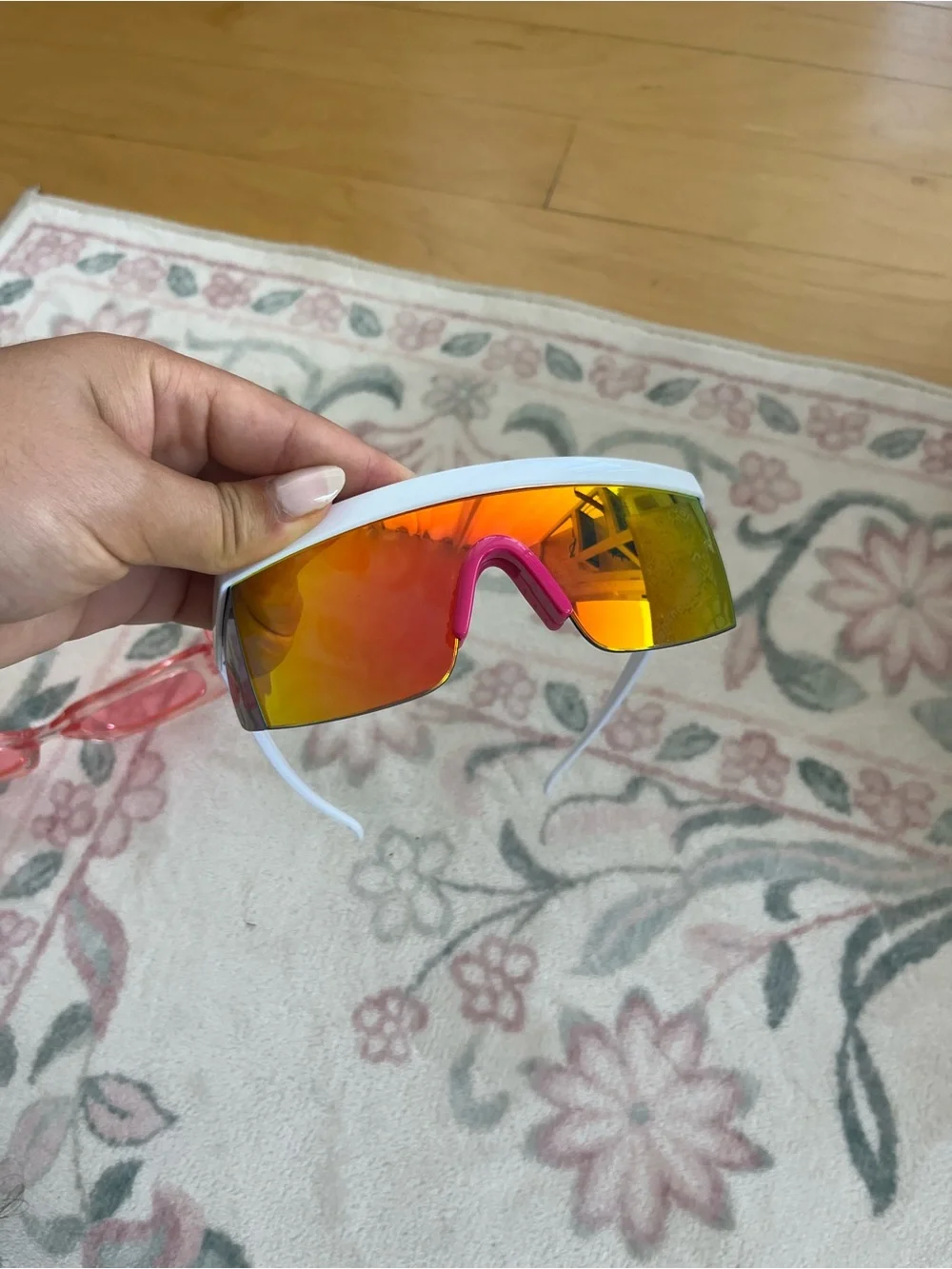 White Frame Shield Sunglasses with Orange Mirrored Lens and Pink Nose Pad